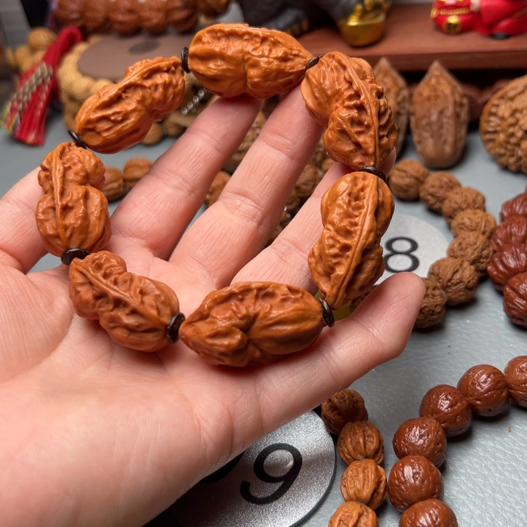 欢***在文玩核桃吊坠核桃手串