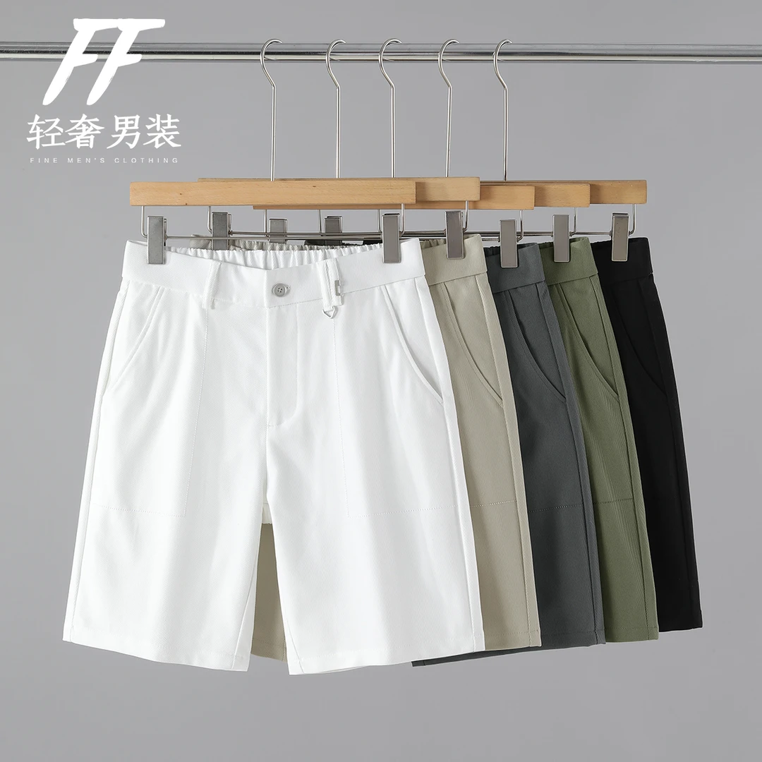 当街潮男小个性点缀五分裤夏季透气亲肤半松紧腰男士简约短中裤