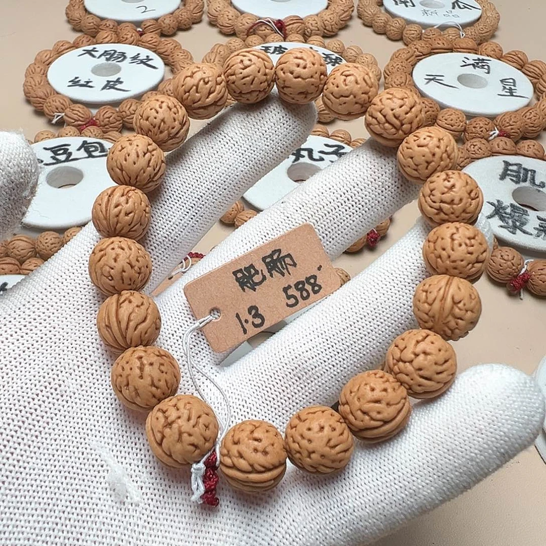 嘦***姕桃核手串1.3肥脐肠纹