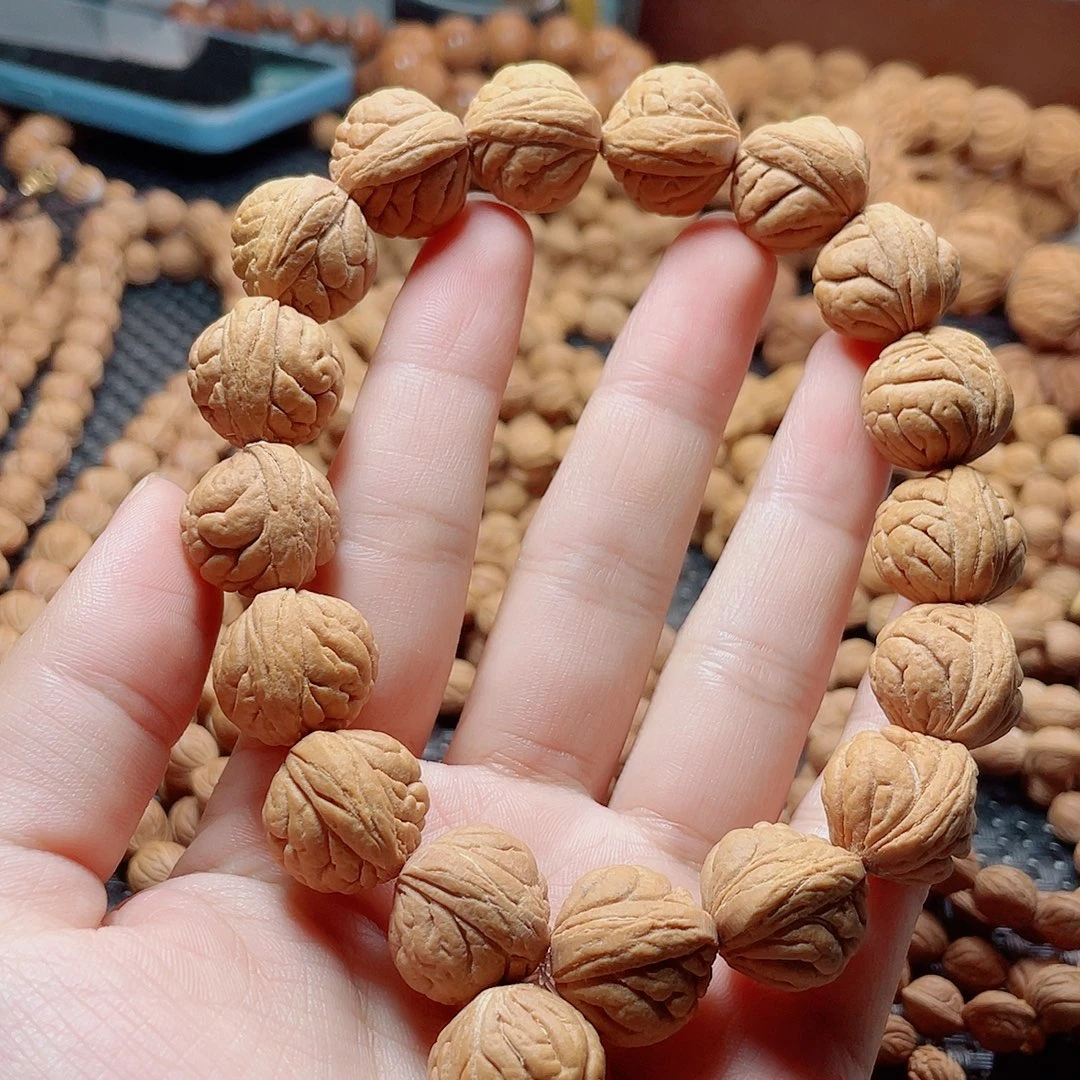 丰***源手串桃核疙瘩豹子头手串