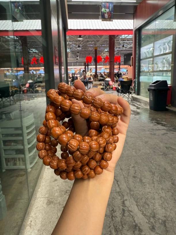 Z 11龙纹桃核手串(二等品)