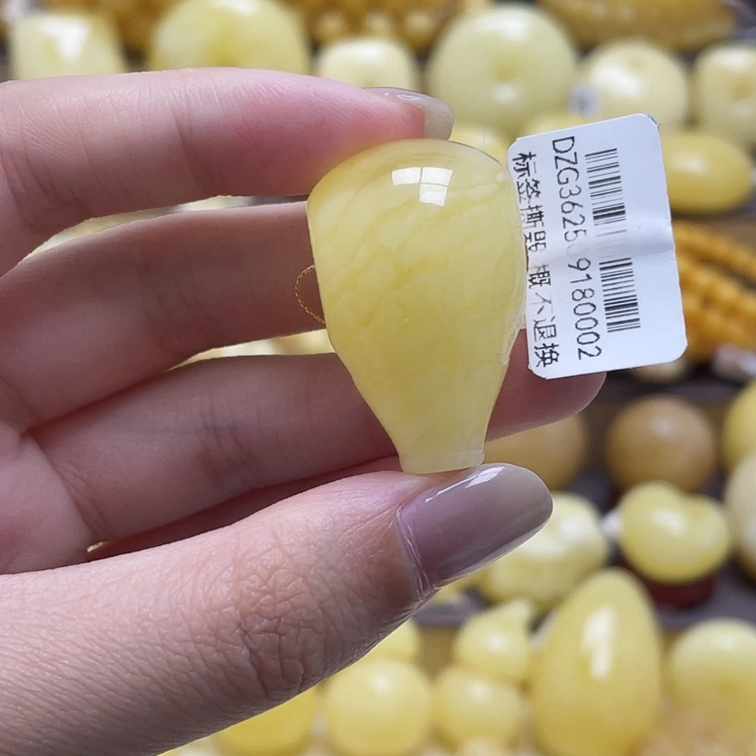 琥珀未镶嵌裸石20*31.8m虎皮妖花三通瑕