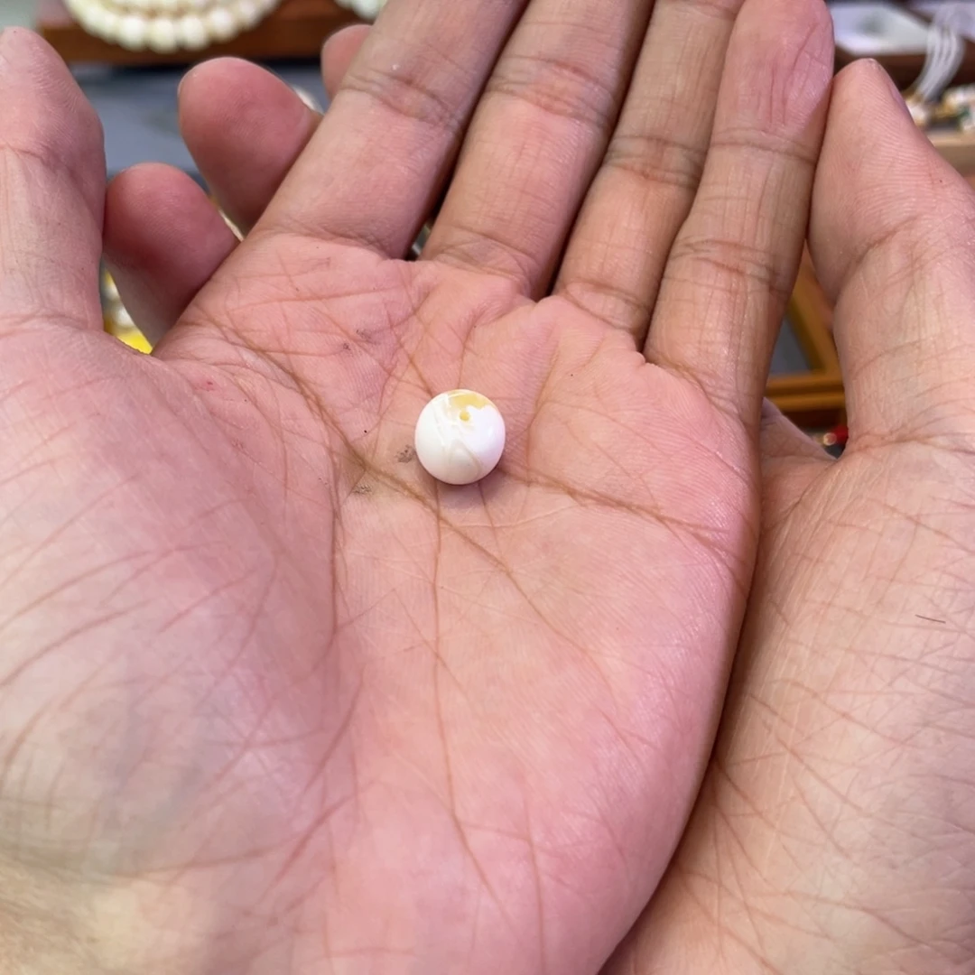 彭***聪琥珀未镶嵌裸石M5001老型单珠