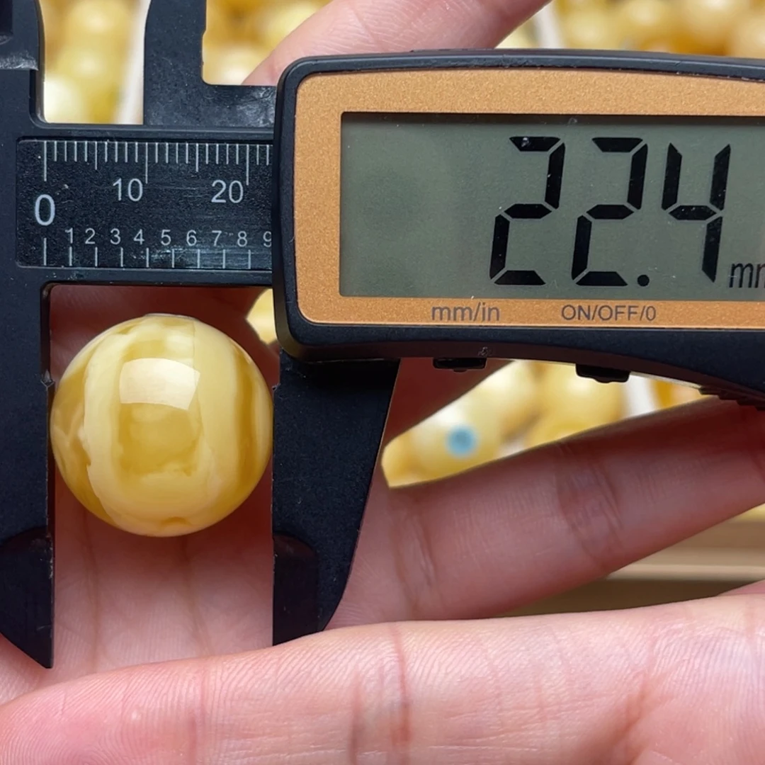 粘***包裸石琥珀未镶嵌蜜蜡圆珠 思思