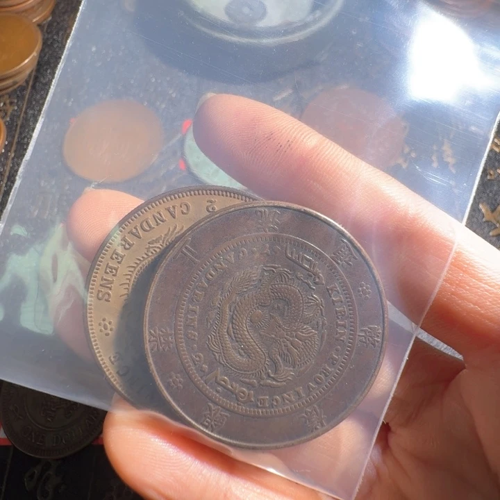 爱***藏两枚工艺制品铜币摆件