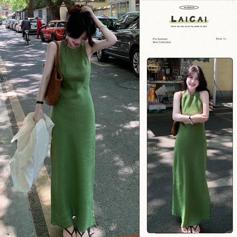 新中式长款旗袍裙2025夏季新款少女感气质显瘦挂脖开叉绿色连衣裙