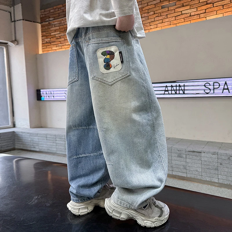 男童春秋款牛仔裤2025新款中大童口袋贴标宽松版裤子儿童牛仔长裤