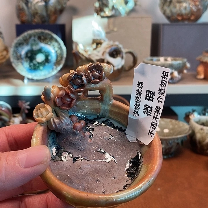 瓷片我们的确是一个人