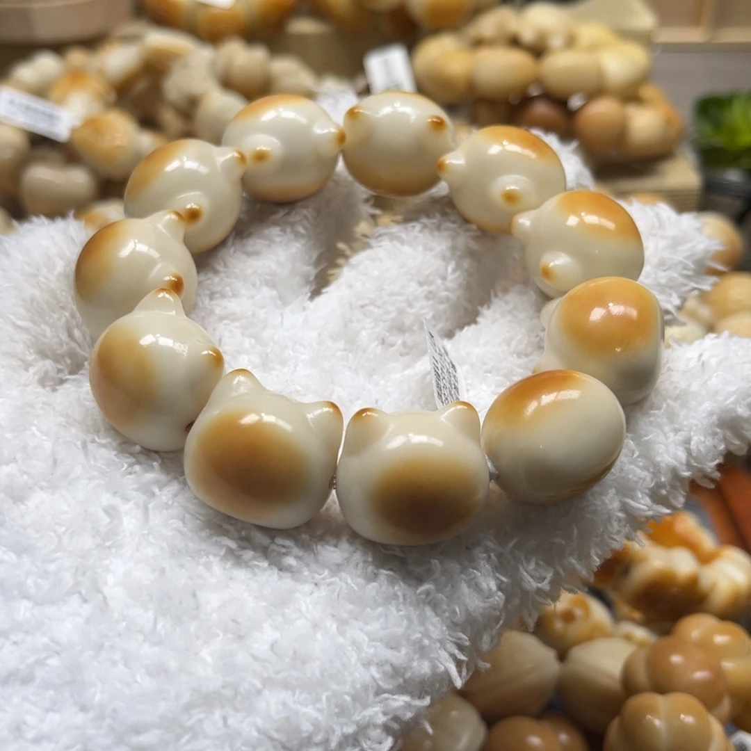 吊坠菩提根/象牙果12.13.27炭烤暹罗猫头瑕疵