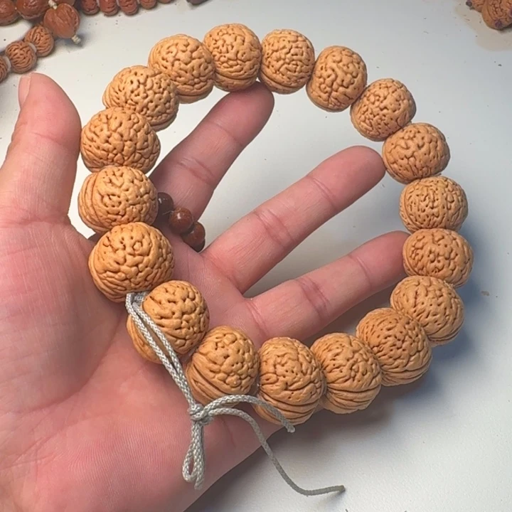 吊坠桃核苹果园桃核手持