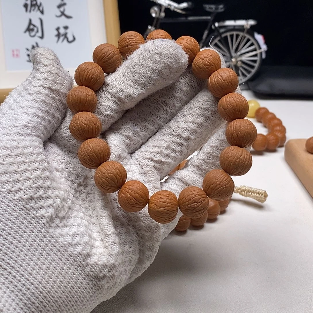 猴头核桃手串づ****猴头核桃凤羽手串原皮