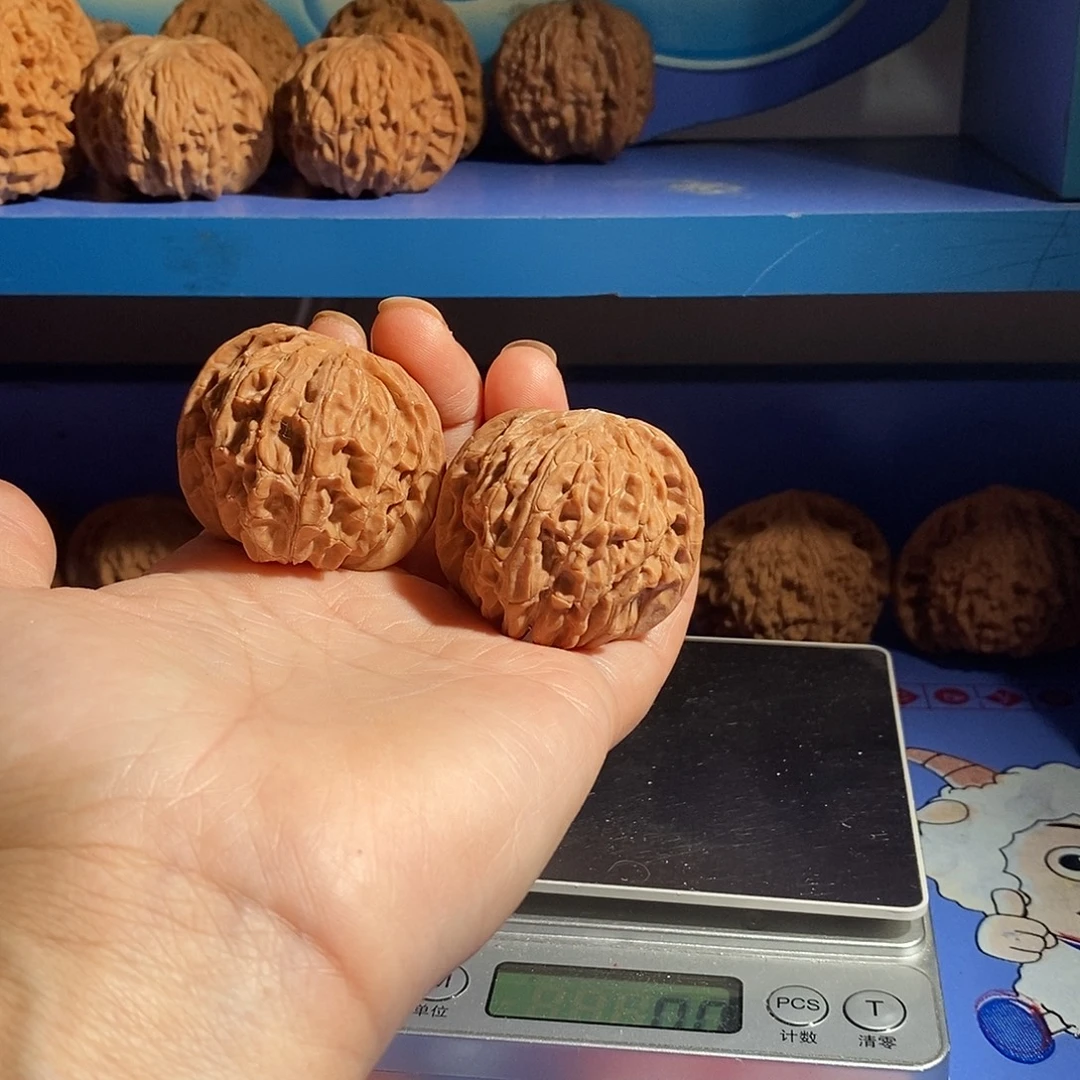 ****力文玩核桃吊坠磨盘