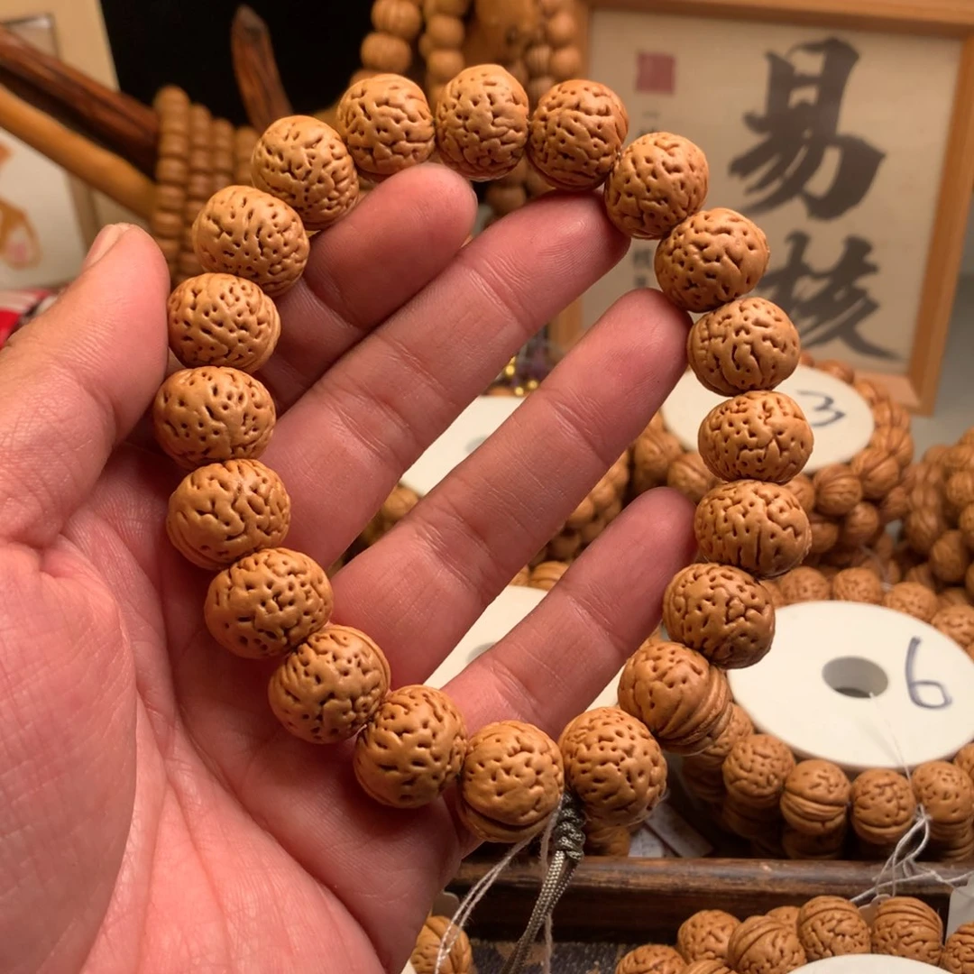 真***财桃核手串1.9小馒头手持