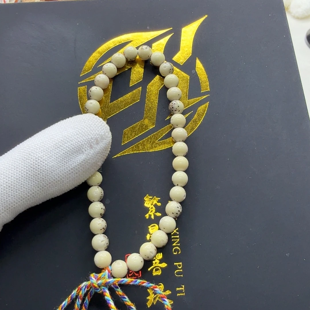 吊坠星月菩提13梵天冰白通体龙蛋6圆手持一物一图