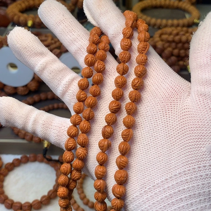 宇****手串桃核秦岭龙纹