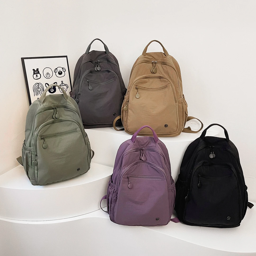 (聚驰正品）高品质大容量双肩包轻便休闲百搭学生书包通勤背包