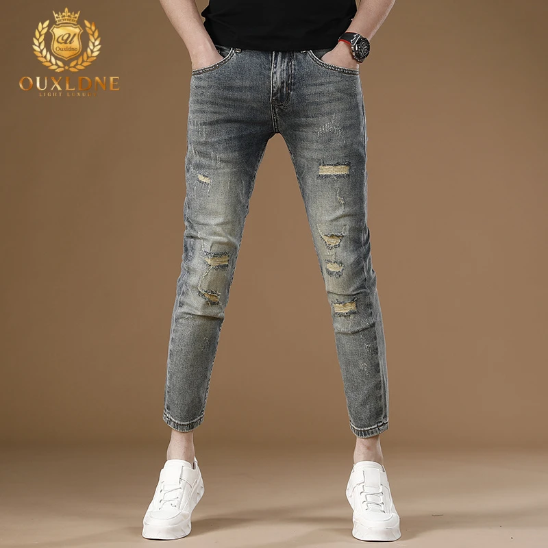 OUXLDNE 修身弹力破洞裤子男士春秋薄款潮流小脚休闲九分牛仔长裤