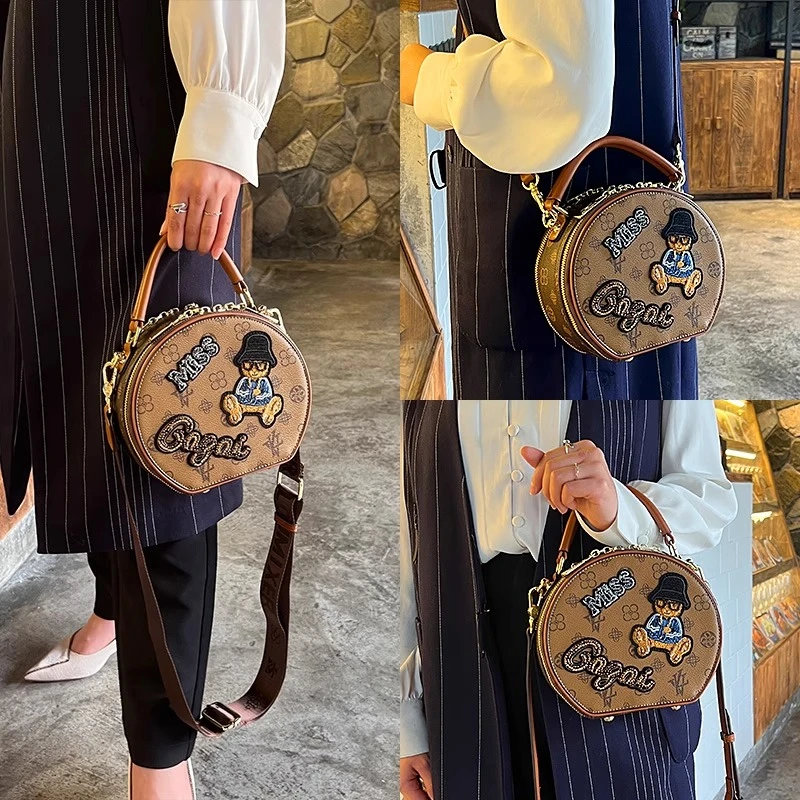 香港代购真皮女包卡通圆饼包2025夏季新款刺绣小圆包单肩斜挎包潮