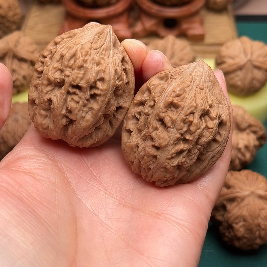 文玩核桃把件丹凤鸡心