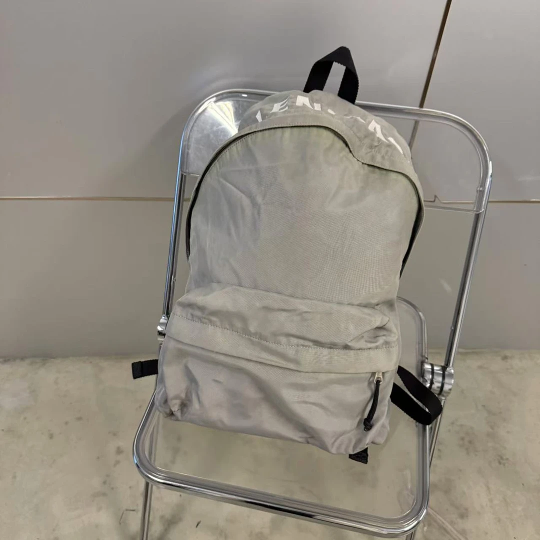 95新 Balenciaga/巴黎世家 经典休闲 字母串标 帆布 双肩包 男包