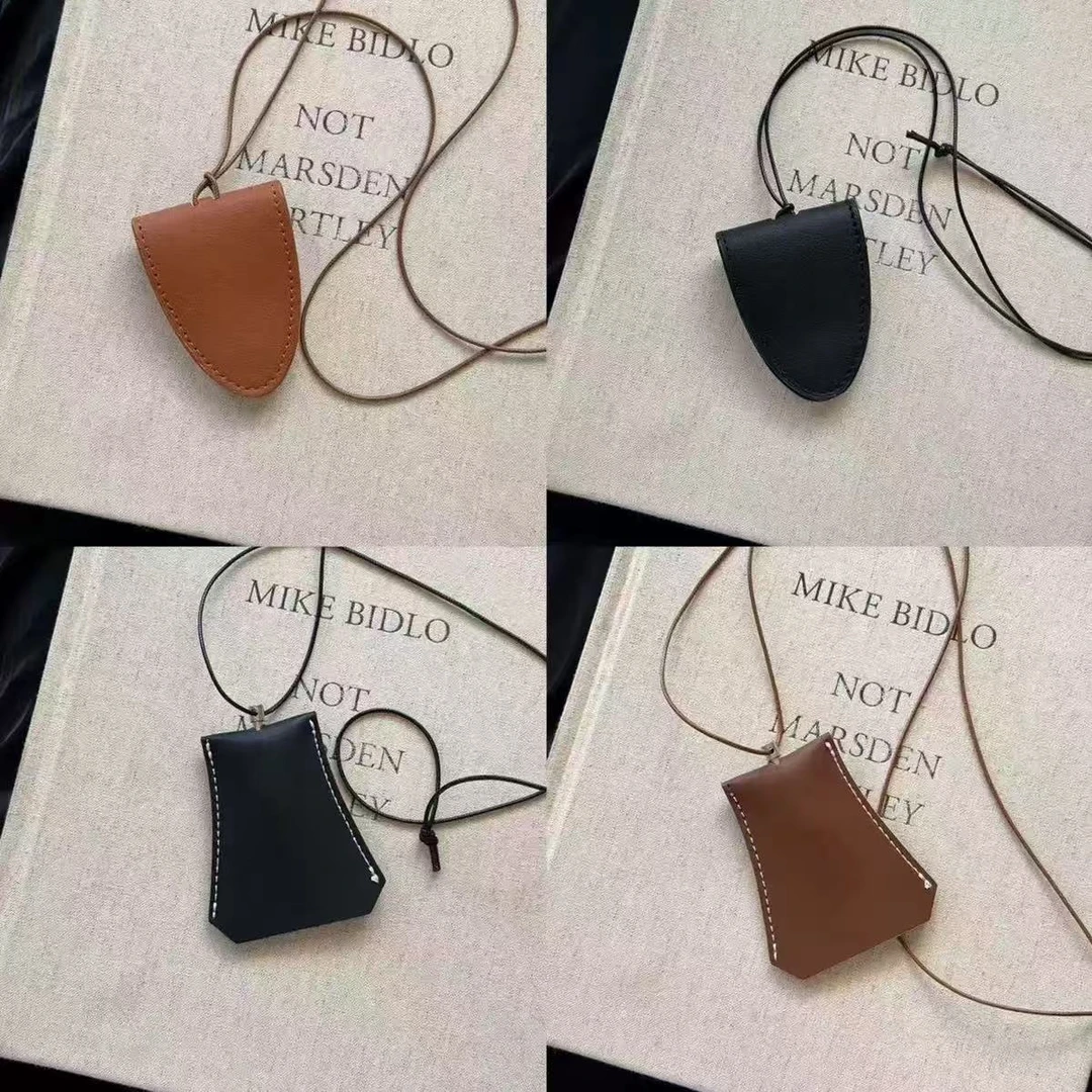 挂脖磁吸多功能皮革墨镜夹项链女款便携眼镜收纳挂绳配饰