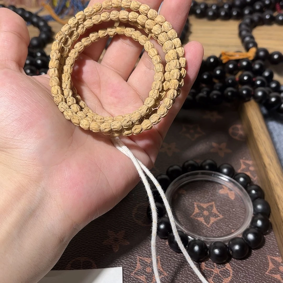 肥***鱼柏香籽/百香籽吊坠手持