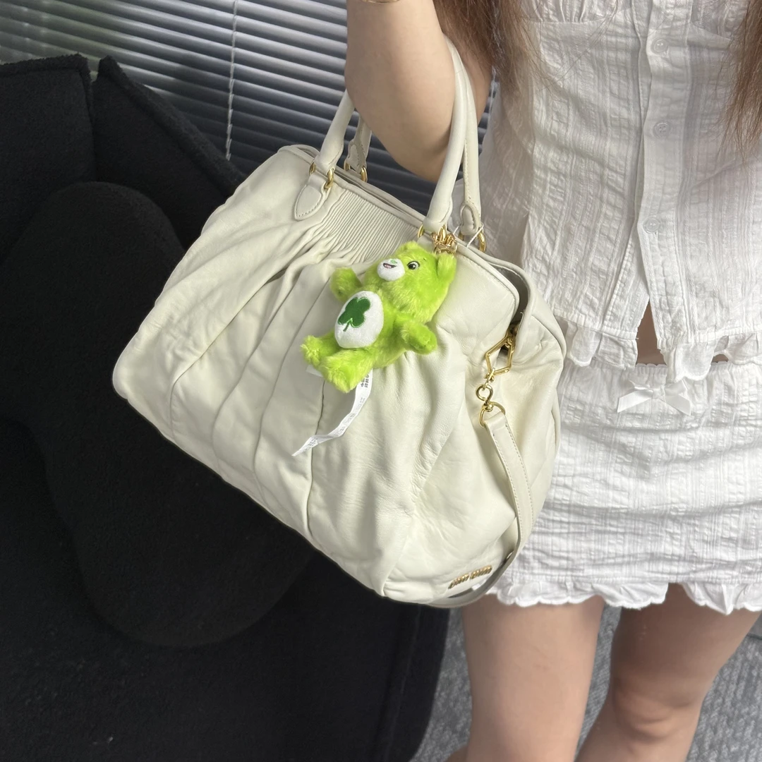 95新 MIU MIU/缪缪 奶昔白侧标手提斜挎包jx
