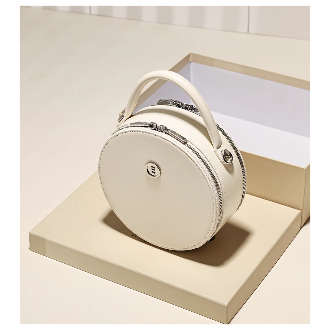 GXFMOD小众简约真皮小圆包女2025新款高级感百搭单肩手提包斜挎包