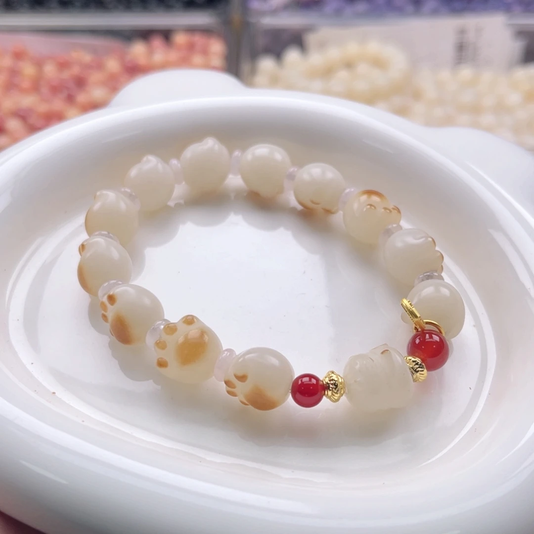 白玉菩提吊坠q12-13mm35颗。炭烧猫爪