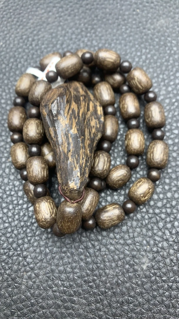 链接555木串桶珠