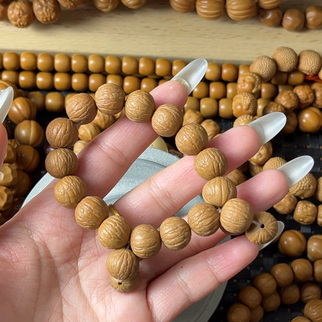 猴头核桃吊坠全品凤羽