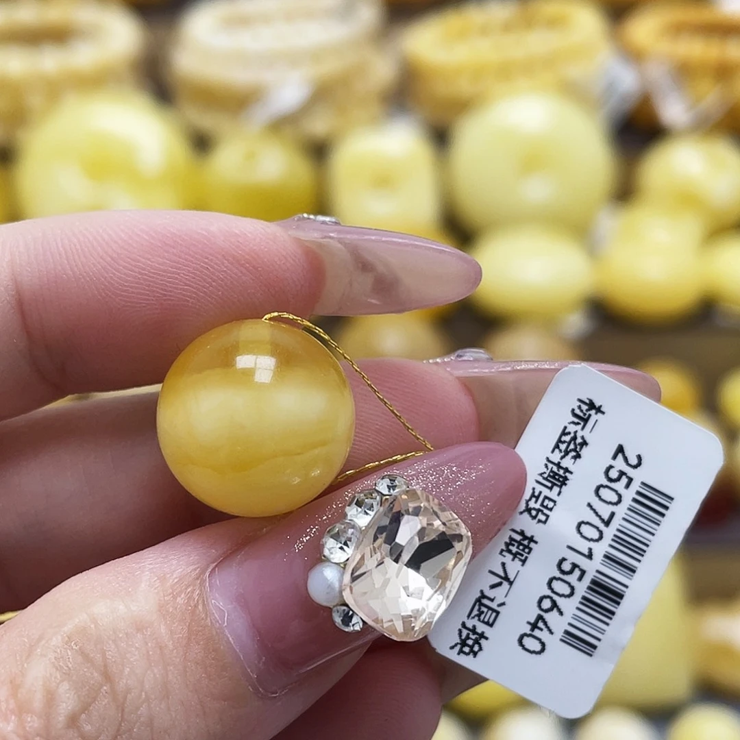 琥珀未镶嵌裸石14.6mm浓蜡妖花溶洞圆珠瑕