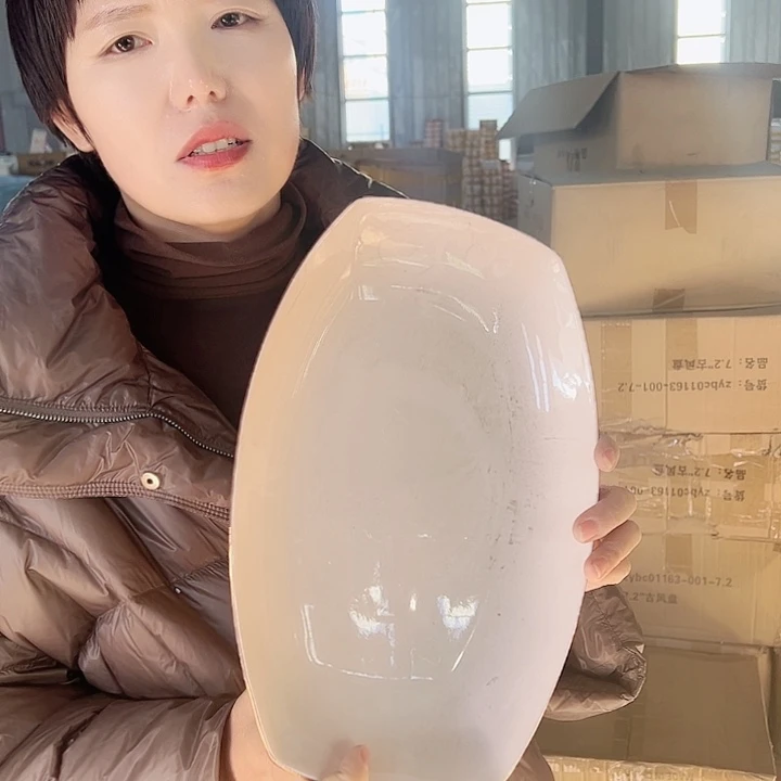 陶瓷粉色鱼盘1个哈哈