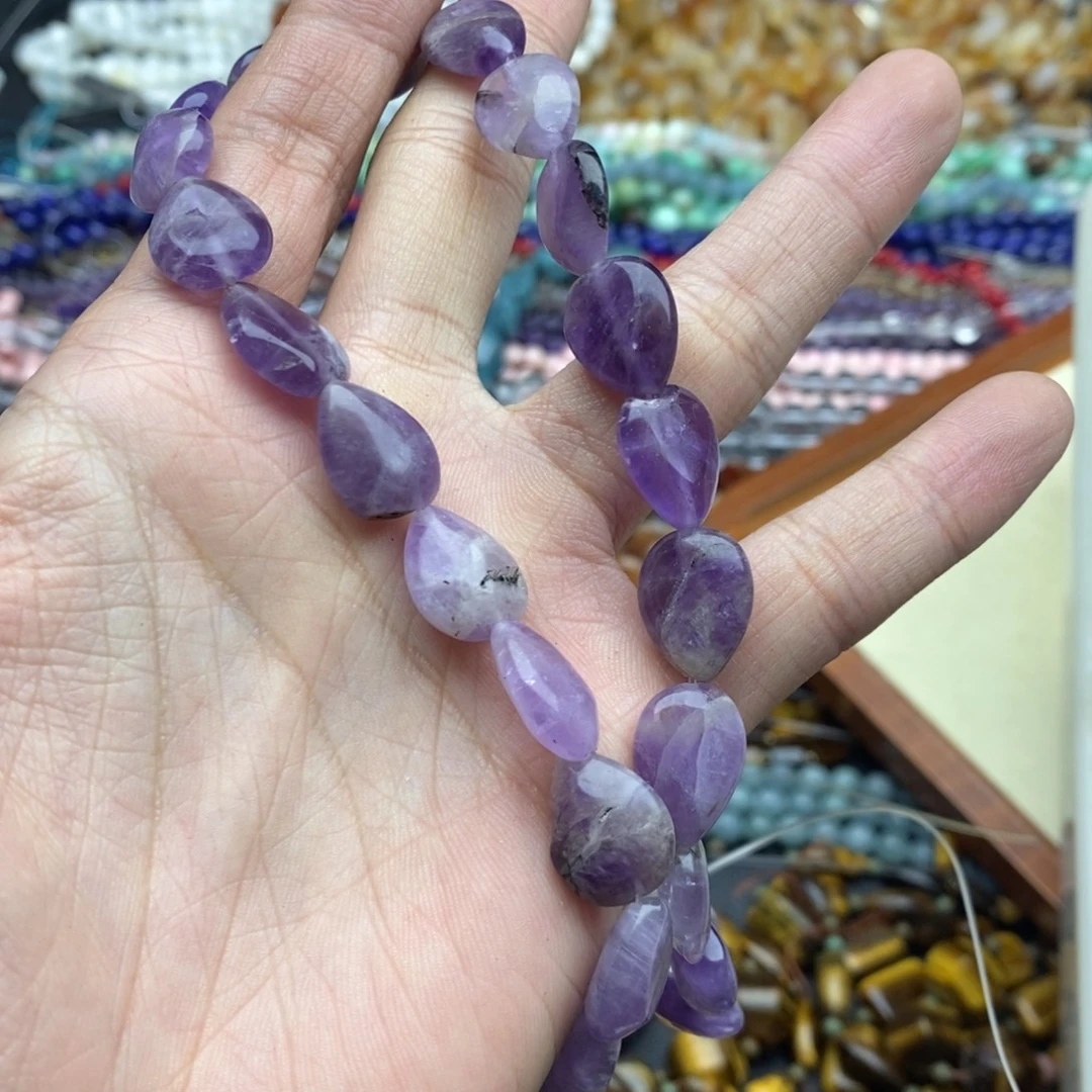 玛瑙/玉髓未镶嵌珠宝半成品一条紫晶水滴有瑕A51