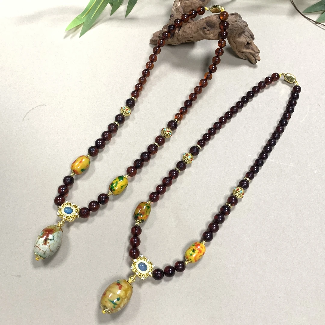 面面来财珠宝M2866-多宝红天血灵珀琥珀项链-多样性发其一