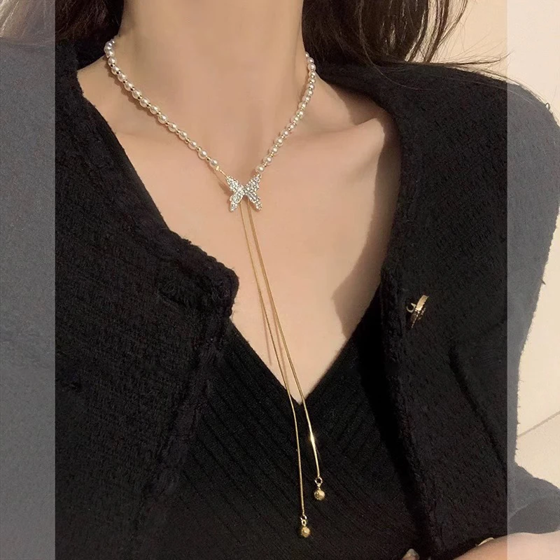 铜合金仿珍珠项链 抽拉满天星蝴蝶流苏毛衣链 千金风唯美