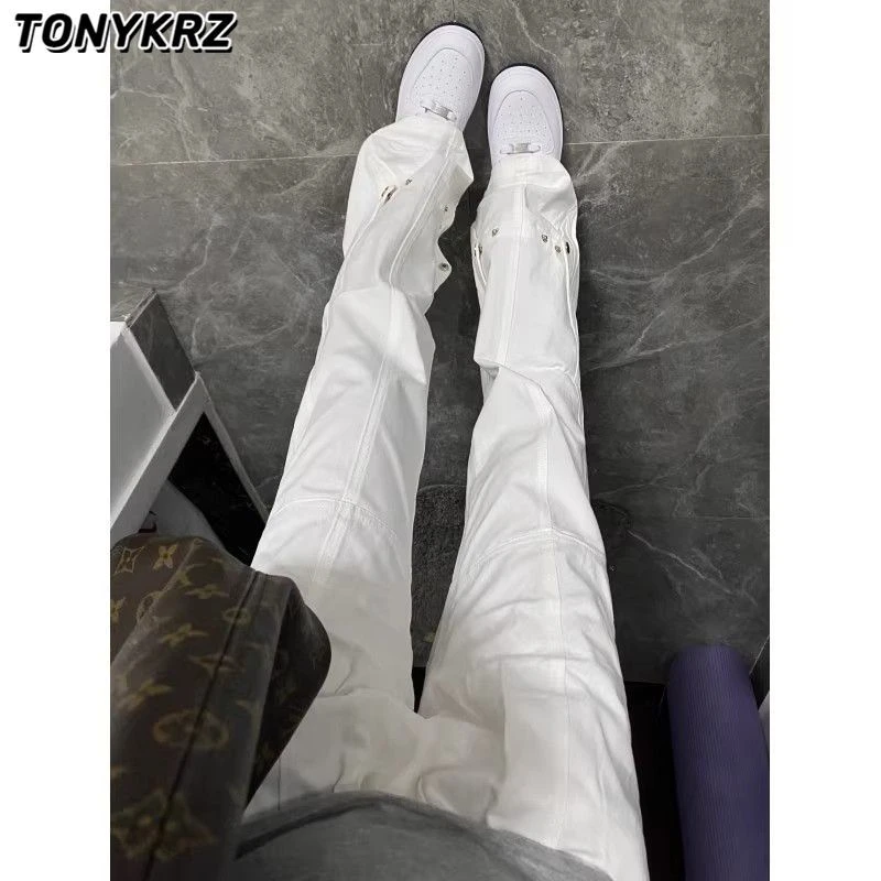 TONYKRZ白色铆钉弯刀牛仔裤男cleanfit直筒裤美式高街修身微喇裤