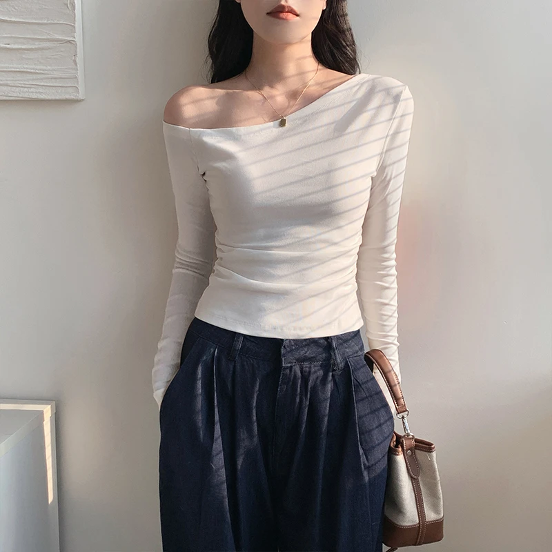 白色斜肩打底衫女内搭2025秋季新款修身辣妹性感露肩长袖t恤上衣
