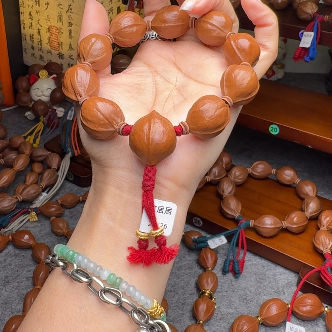 王***一手串橄榄核20/26带三通 老核 原皮 梅林铁核