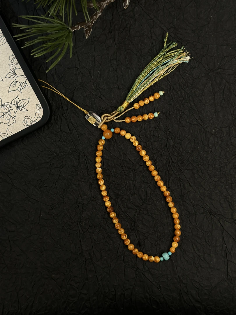 【亿心珠宝】4mm+妖花圆珠蜜蜡绿松手机链挂件设计款（多样性发一件)