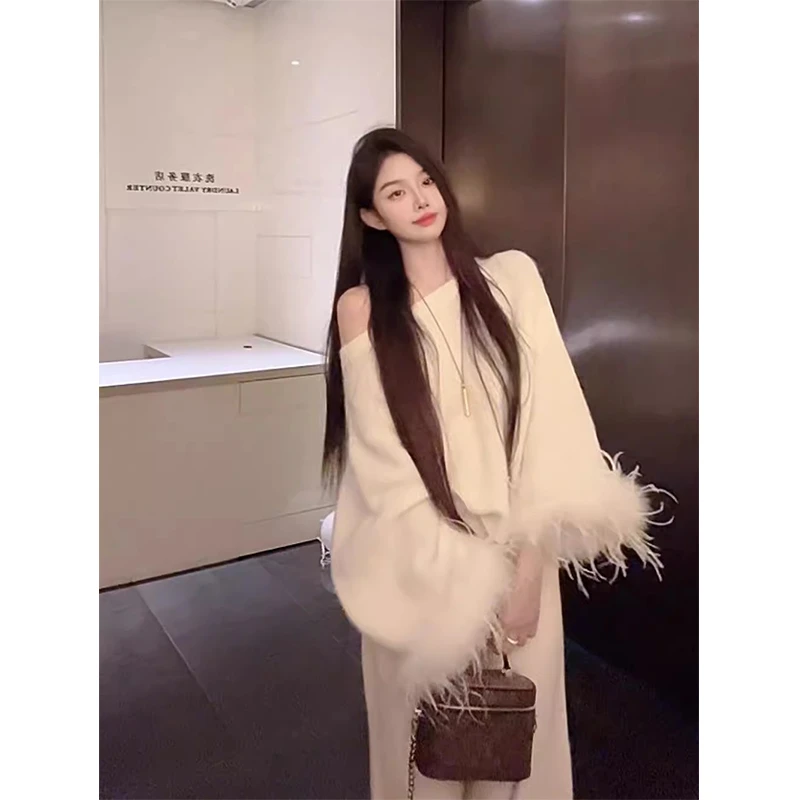 法式白色斜肩披肩斗篷毛衣女秋季宽松慵懒风高级感气质套头针织衫