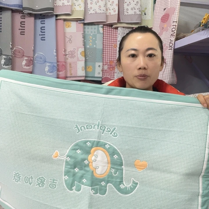 棉特价绿色吉祥像