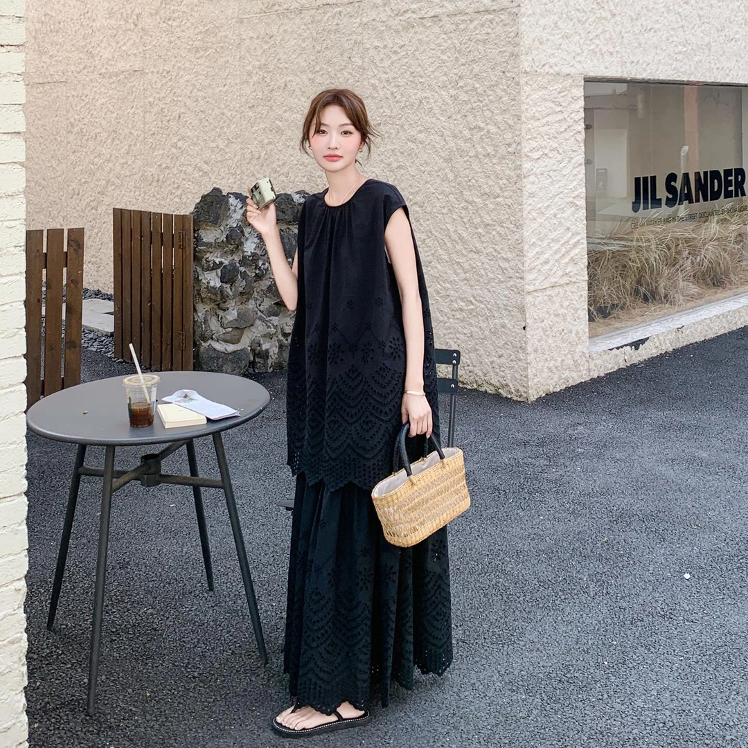 黑色冷淡系高级感套装裙女夏2025新款镂空上衣半身裙松弛感两件套