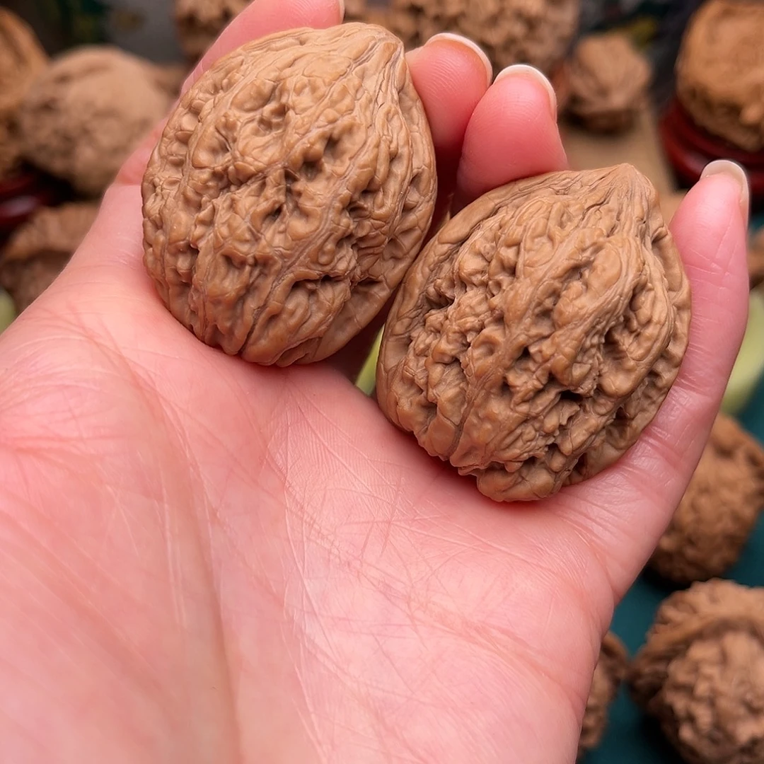 文玩核桃把件丹凤鸡心