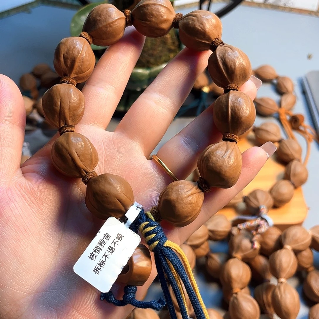 罗***记手串/手链橄榄核18/22梅林铁核
