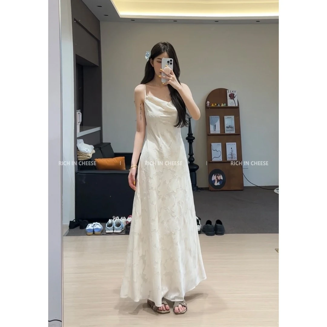 舒胡蕾 月光白茶 镂空印花吊带连衣裙气质显瘦法式温柔夏季长款