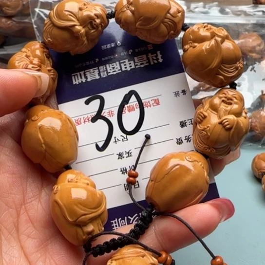 橄榄核吊坠橄榄雕工艺的