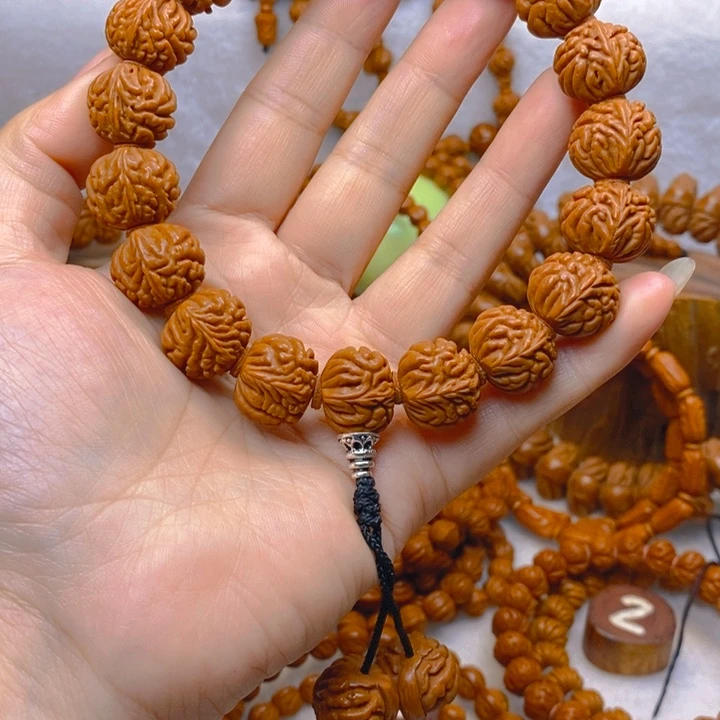 吊坠桃核盘龙手持