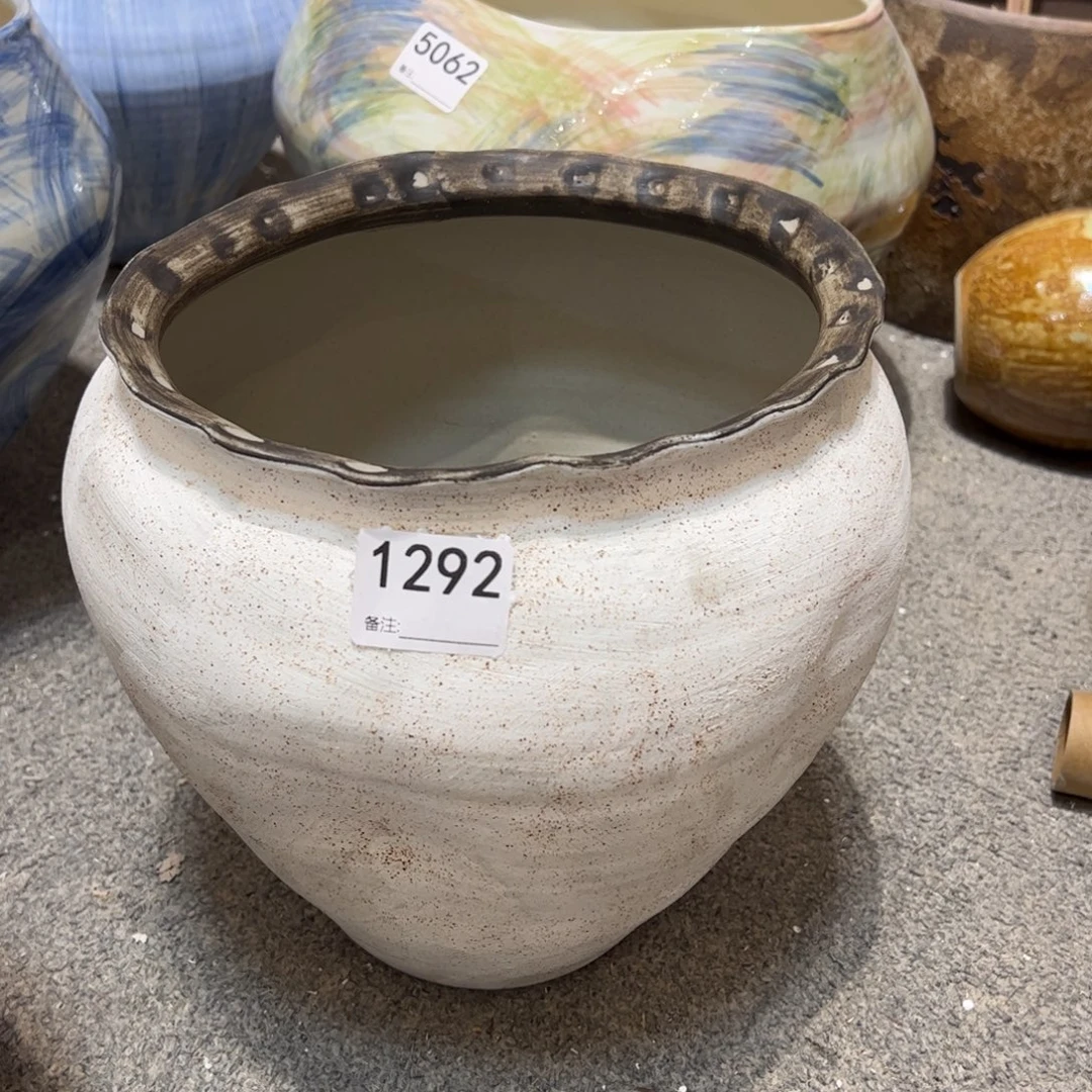 喜***铺瓷片1292高26口21已打孔