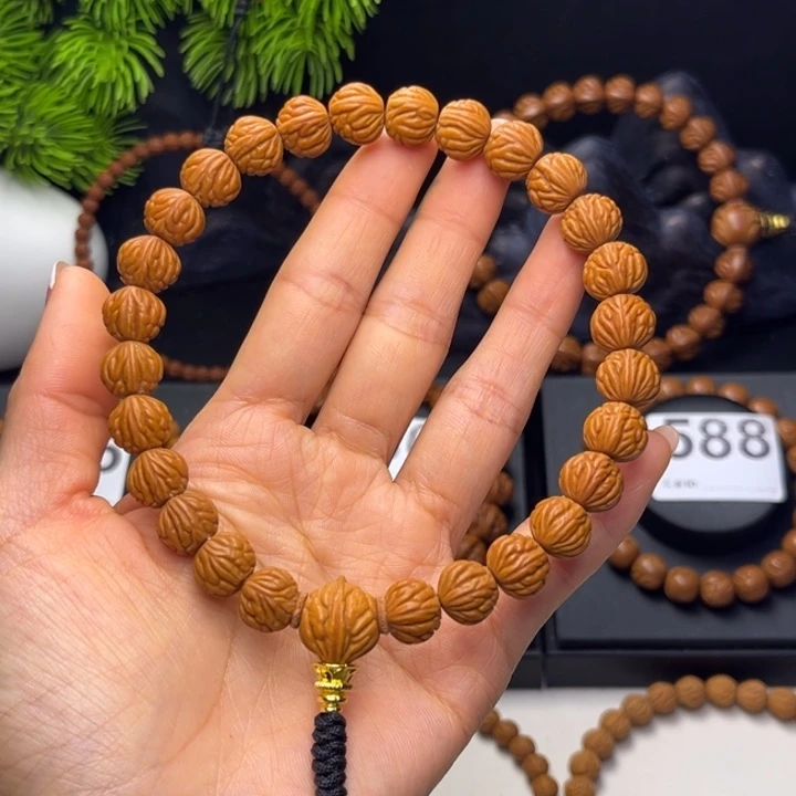 L****吊坠桃核小金豆11